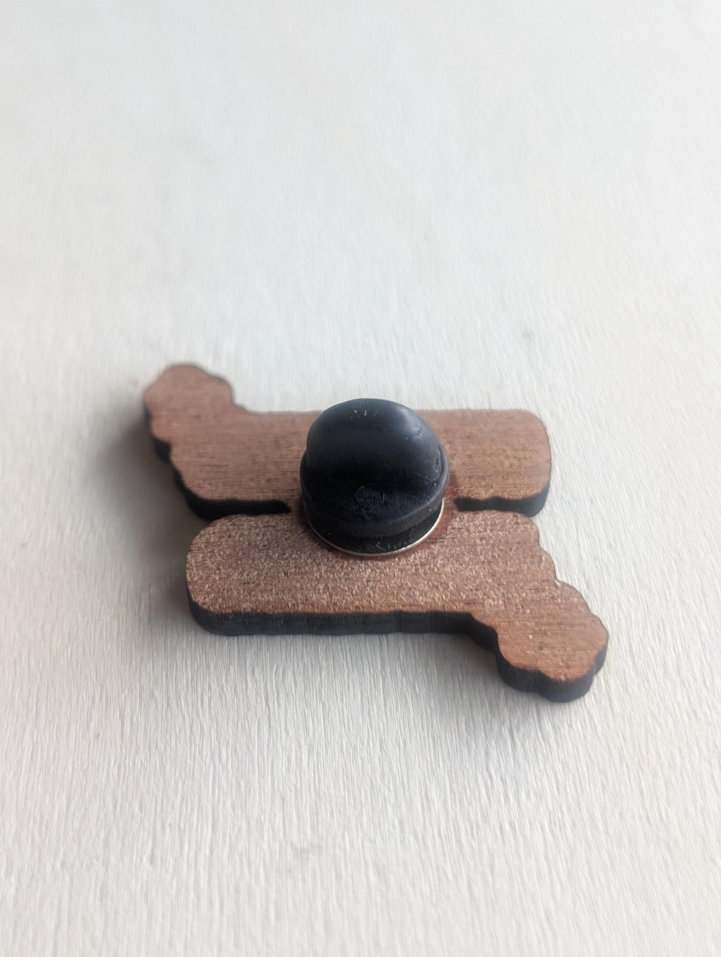 Mahogany overworked and underpaid wooden pin badge, funny badges