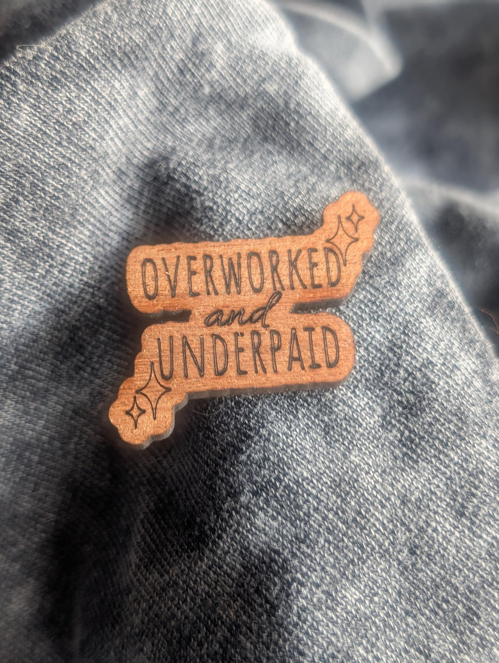 Mahogany overworked and underpaid wooden pin badge, funny badges